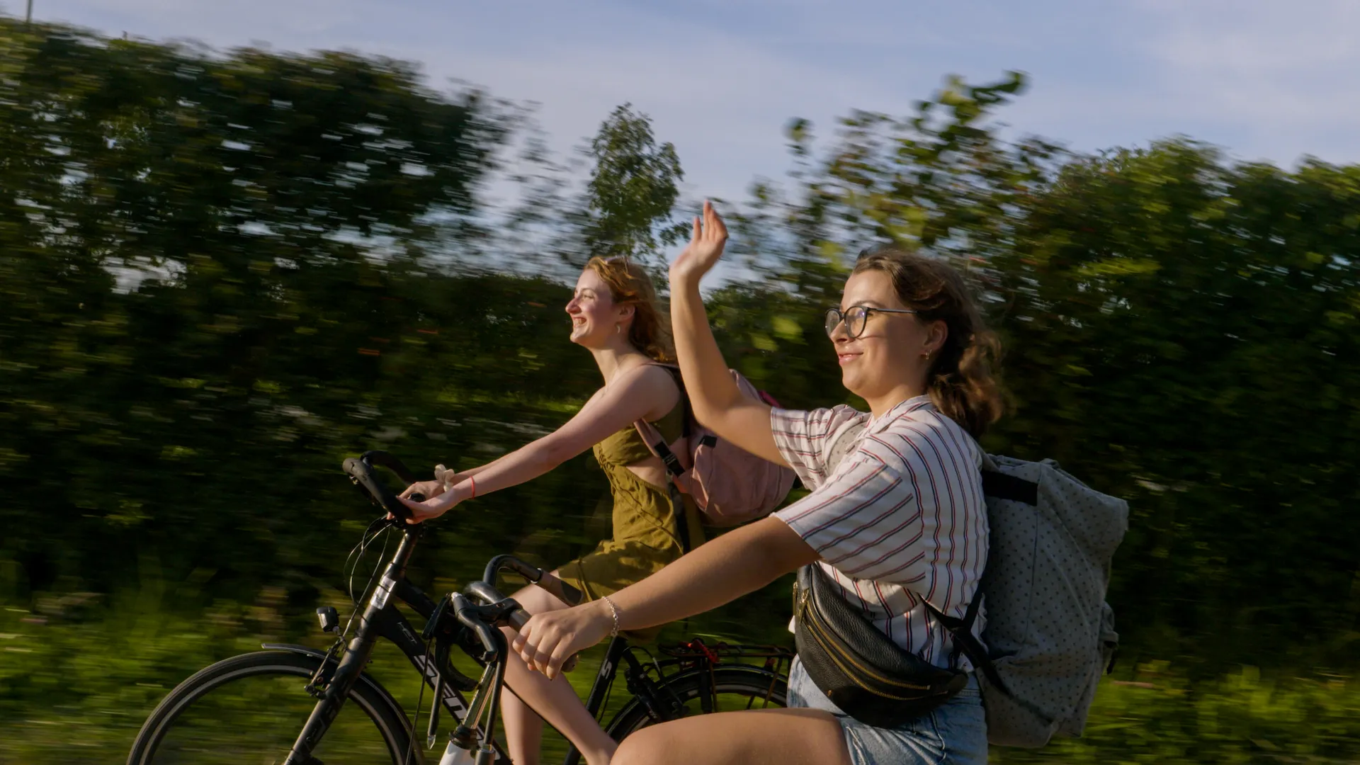 Two students cycling in Middelburg