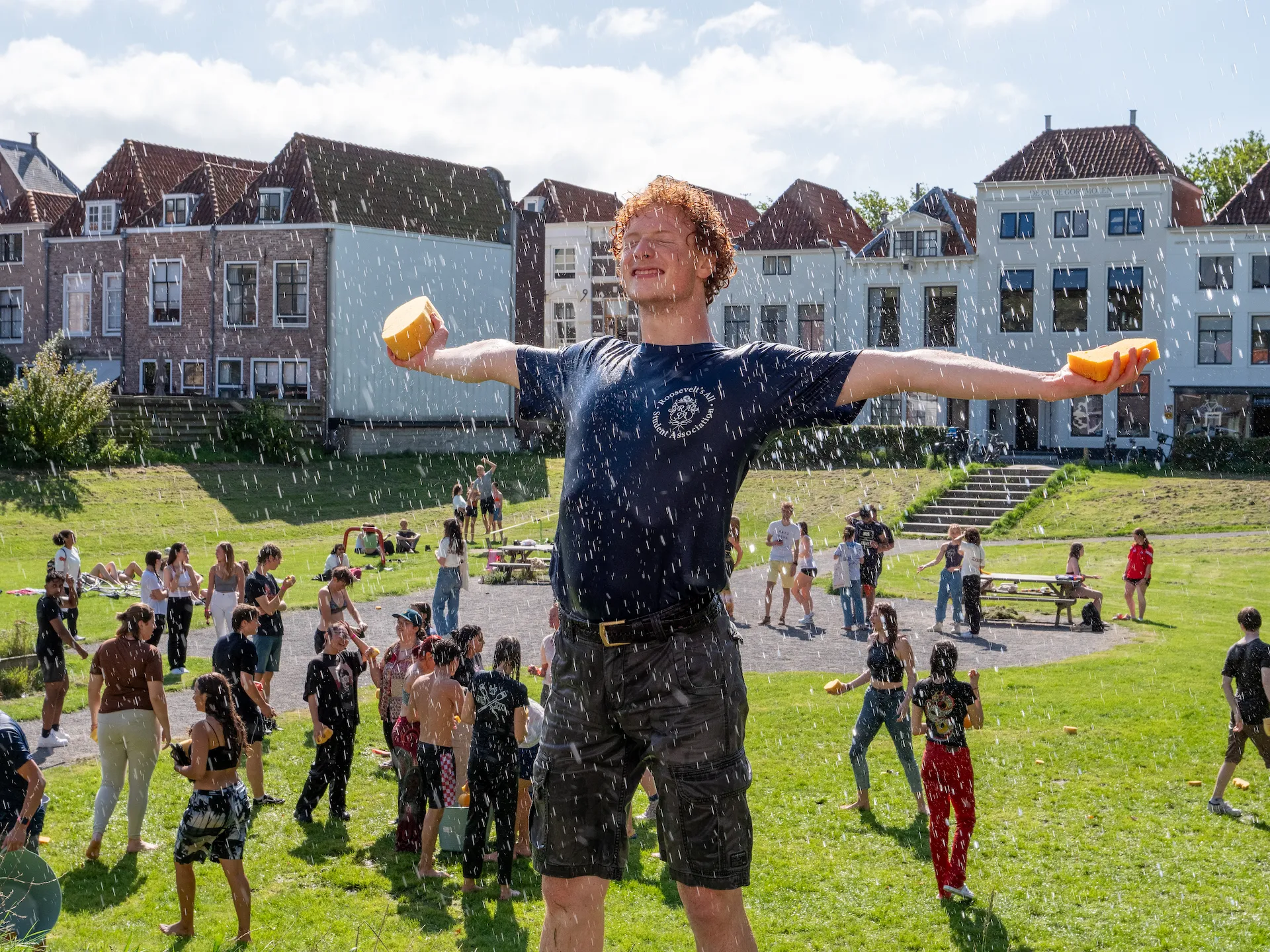 College student in a water fight during orientation