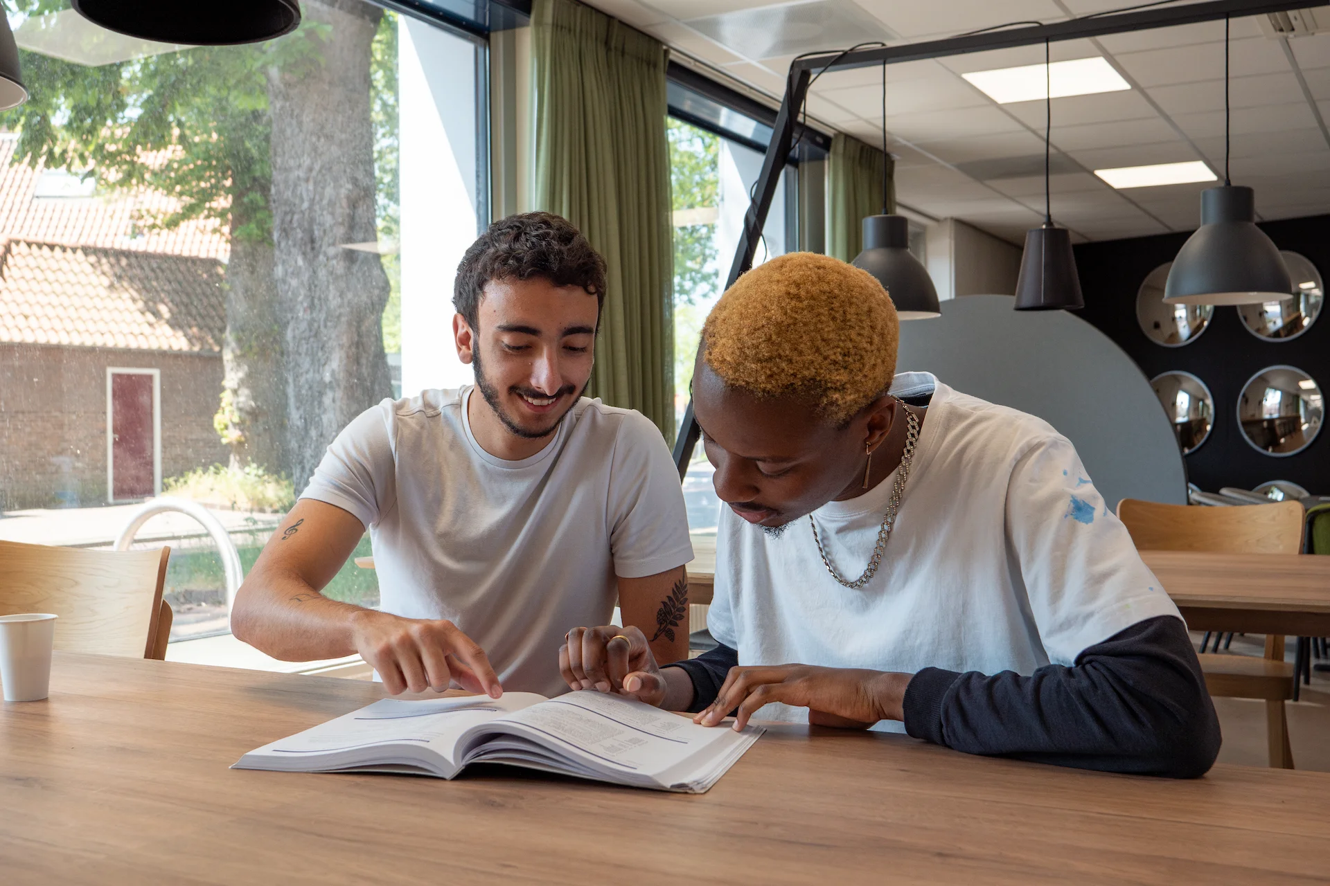 Two college students studying at the University College Roosevelt campus