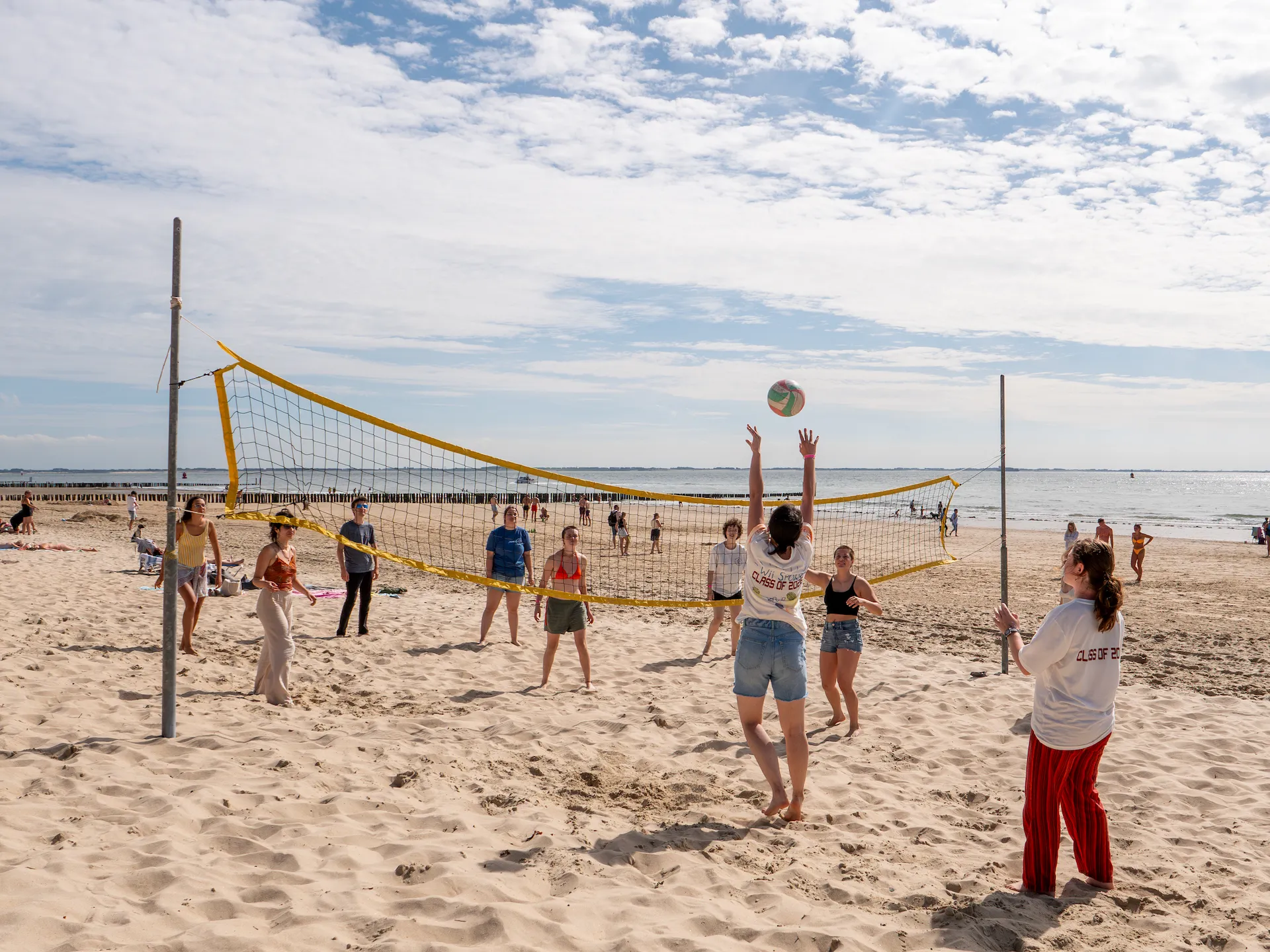 Students playing Vollyball at the beach in Zeeland